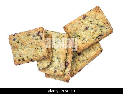 Dry crackers isolated on white background. Cracker cookies with herbs top view Stock Photo