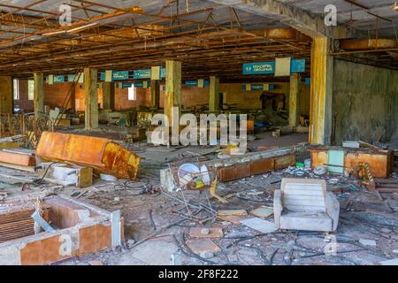 Broken convenience store inside of Pripyat town in the Ukraine Stock Photo