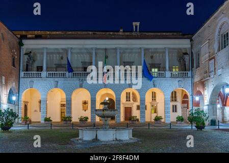 Night view of yard of Palazzo del Broletto in Italian city Brescia Stock Photo