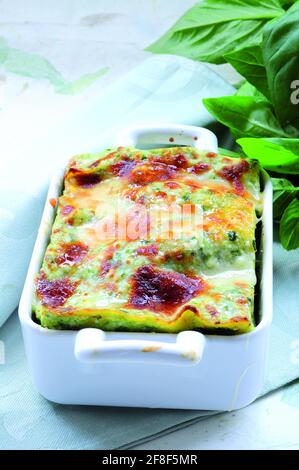 Traditional italian lasagna with pesto Stock Photo