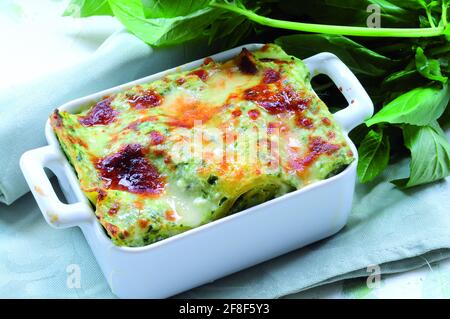 Traditional italian lasagna with pesto Stock Photo