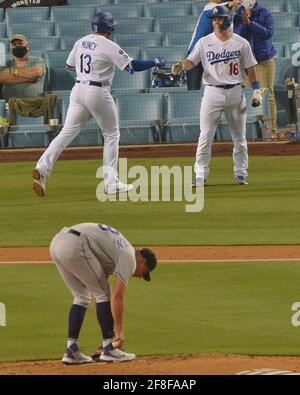 Los Angeles, United States. 14th Apr, 2021. Los Angeles Dodgers' first baseman Max Muncy celebrates his solo home run in the sixth inning off Colorado Rockies relief pitcher Robert Stephenson with catcher Will Smith at Dodger Stadium in Los Angeles on Tuesday, April 13, 2021. The Dodgers defeated the Rockies 7-0. Photo by Jim Ruymen/UPI Credit: UPI/Alamy Live News Stock Photo