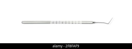 Dentist equipment: Diagnostic dental probe, stainless steel explorer. Dental tool isolated on white background, macro close up. Stock Photo