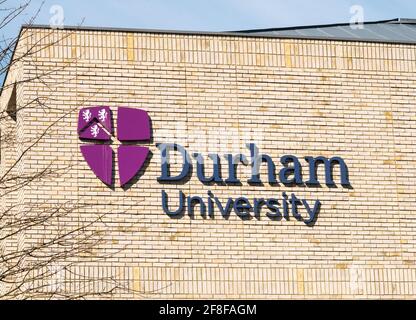 The logo of Durham University on a building within the Durham city campus, England, UK Stock Photo