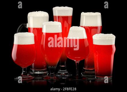 Set of fresh stout beer glasses with bubble froth isolated on black background. Stock Photo