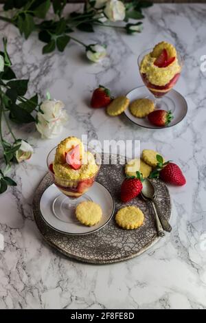 Tiramisù with coconut and strawberries Stock Photo