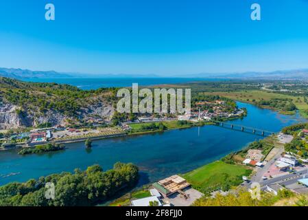 Aerial view of Buna river and adjacent village near entrance to Skadar lake in Albania Stock Photo