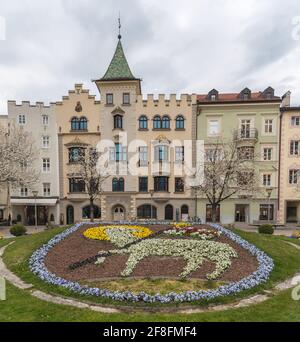 Town hall (Rathaus Municipio) and coat of arms made with flowers of Bressanone - Brixen. Trentino Alto Adige South Tyrol, Südtirol, Italy. Stock Photo