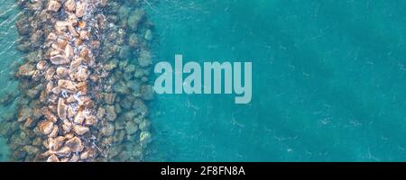Aerial top down view on artificial reef close to the shore in Mediterranean sea Stock Photo