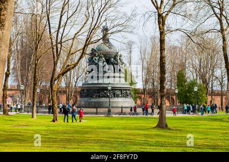 Veliky Novgorod,Russia - April 29,2018. Kremlin park and the monument Millennium of Russia with tourists walking along Stock Photo