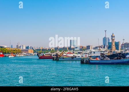 View of the port of Barcelona with Torre del Rellotge tower, Spain Stock Photo