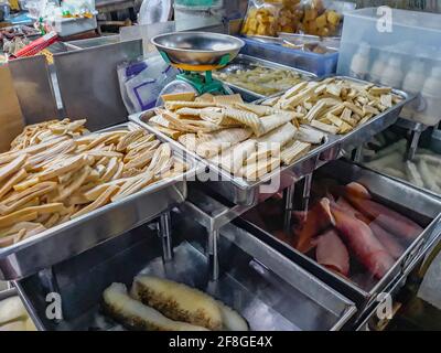 Disgusting unfamiliar Thai food and Chinese cuisine in street food market in China Town Bangkok Thailand. Stock Photo