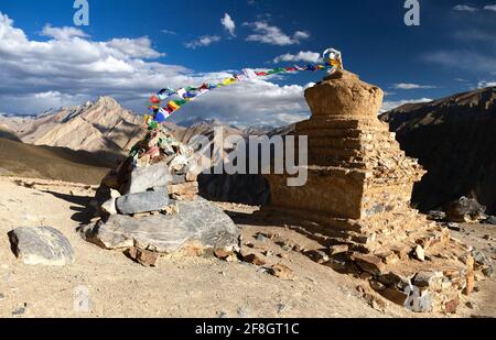 Evening view of stupas with prayer flags in Zanskar valley, Zanskar trek, Ladakh, Jammu and Kashmir, India Stock Photo