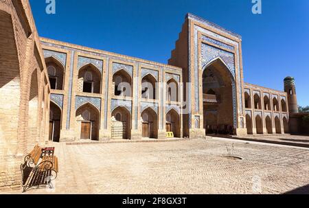 Mohammed Rakhim Khan Medressa in Itchan Kala (Ichon Qala) - Khiva (Chiva, Heva, Xiva, Chiwa, Khiveh) - Xorazm Province - Uzbekistan - Town on the silk Stock Photo