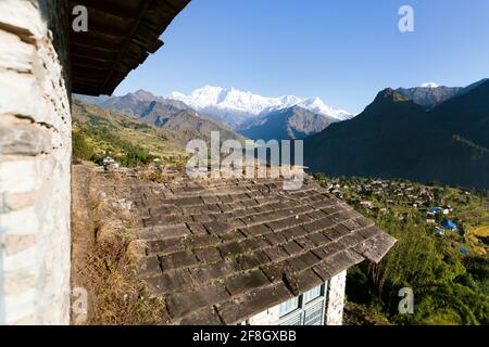 Beautiful village in western Nepal with Dhaulagiri Himal Stock Photo