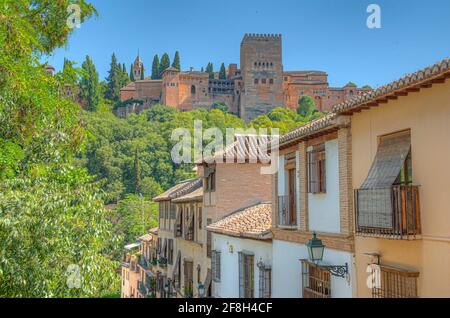 Alhambra palace viewed from a street in Albaicin district in Granada, Spain Stock Photo