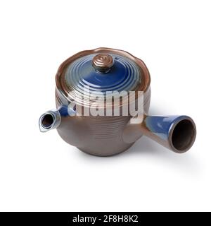 Single ceramic Japanese teapot  isolated on white background Stock Photo