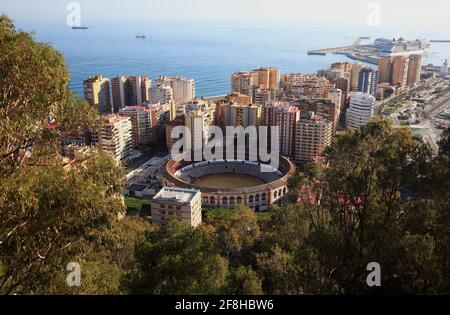 Malaga, view from the castle Castillo de Gibralfaro to the city with the bullring, Plaza de Toros, and the harbour, Spain, Andalusia Stock Photo