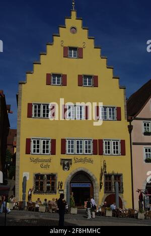 Medieval house, operating as restaurant/cafe in the old Romantic Road town of Rothenburg ob der Tauber, Bavaria, Germany Stock Photo