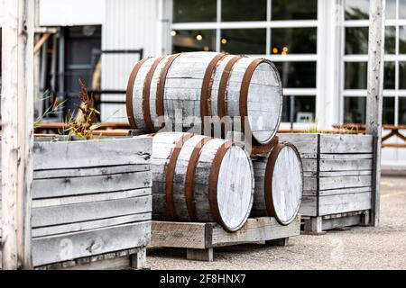 view of three barrels horizontally placed to decorate outdoor Stock Photo