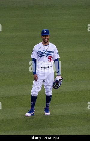 MookieBetts wears a @nickfouquet hat, @hiltonturner_ suit,  @drmartensofficial shoes, and @garrettleight shades for the @dodgers vs…