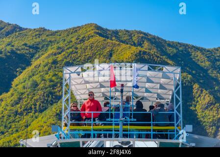 LAKE KOMAN, ALBANIA, SEPTEMBER 21, 2019: Ferry cruising lake Koman in Albania Stock Photo