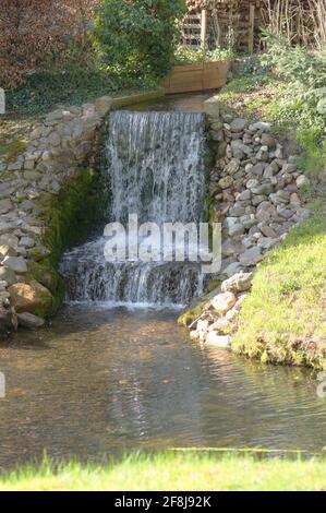 Small waterfall with rocks in Rozendaal in the Netherlands Stock Photo