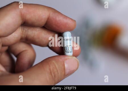 Fioricet pill. Generic names: Butalbital Acetaminophen. Medication used to treat tension headaches with caffeine acetaminophen and Butalbital Stock Photo