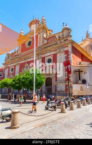 SEVILLA, SPAIN, JUNE 25, 2019: People are strolling in front of the el divino salvador church in Sevilla, Spain Stock Photo