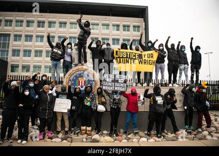 Brooklyn Center, United States. 13th Apr, 2021. Protestors march near the Brooklyn Center Police Department on April 13, 2021 in Brooklyn Center, Minnesota after the killing of Daunte Wright. Photo: Chris Tuite/ImageSPACE Credit: Imagespace/Alamy Live News Stock Photo