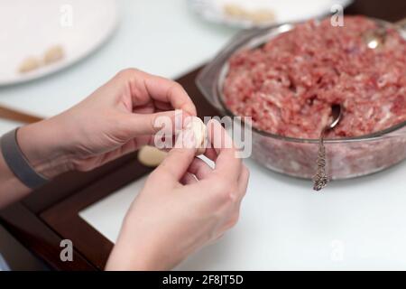 The cook is making pelmeni at home Stock Photo