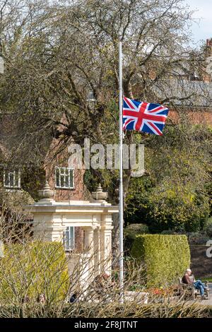 Union Jack flag flying at half mast following the death of Prince Philip, Duke of Edinburgh, Guildford Castle Grounds, April 2021, Surrey, UK Stock Photo