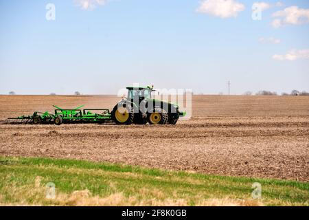 Lily Lake, Illinois, USA. A farmer preparing his fields on a large farm in northeastern Illinois. Stock Photo