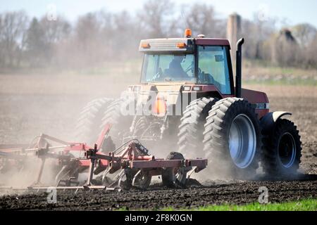 Kaneland, Illinois, USA. A farmer preparing his fields on a large spread in northeastern Illinois. Stock Photo