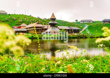 View at Prashar Lake located at a height of 2730 m above sea level with a three storied pagoda-like temple of sage Prashar near Mandi, Himachal Prades Stock Photo