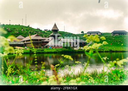 View at Prashar Lake located at a height of 2730 m above sea level with a three storied pagoda-like temple of sage Prashar near Mandi, Himachal Prades Stock Photo