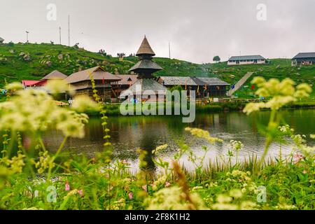 View at Prashar Lake located at a height of 2730 m above sea level with a three storied pagoda-like temple of sage Prashar near Mandi, Himachal Prades Stock Photo