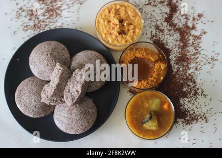 Steamed Cakes Made With Finger Millets And Skinned Black Gram. Locally ...