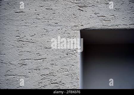 Concrete wall, lines and shapes in an architectural simple concept photograph, close-up, hand held, colour photography with a copy space. Stock Photo