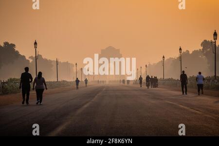 Silhouette of triumphal arch architectural style war memorial during hazy morning. Pollution level rises and causes smog in autumn season due stagnant Stock Photo