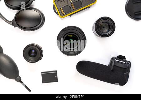 Arranged photography tools isolated on white background. Top view. Stock Photo