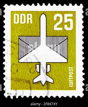MOSCOW, RUSSIA - OCTOBER 7, 2019: Postage stamp printed in Germany shows Airmail, serie, 25 Pf. - East German pfennig, circa 1989 Stock Photo