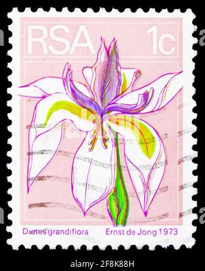 MOSCOW, RUSSIA - OCTOBER 7, 2019: Postage stamp printed in South Africa shows Large White Iris (Dietes grandiflora), Definitives Flora and Fauna serie Stock Photo
