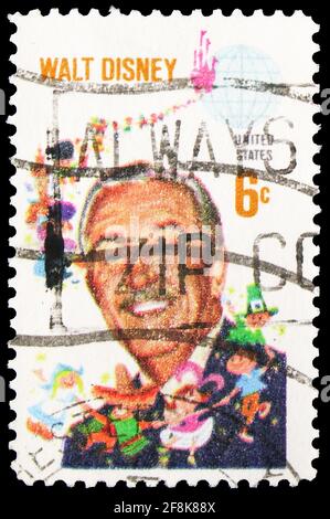MOSCOW, RUSSIA - OCTOBER 7, 2019: Postage stamp printed in United States shows Walt Disney (1901-1966) and Children of the World, Walt Disney Issue se