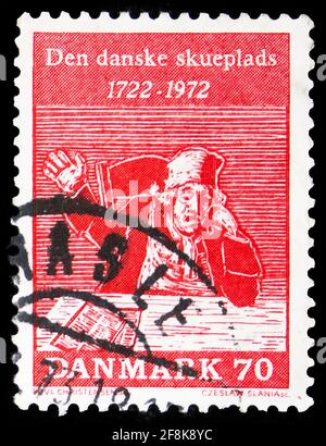 MOSCOW, RUSSIA - OCTOBER 7, 2019: Postage stamp printed in Denmark shows 'The Tinker' (from Holberg's satire), Holberg's Comedies - 250th Anniversary Stock Photo