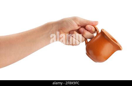 clay jar in hand path isolated on white Stock Photo