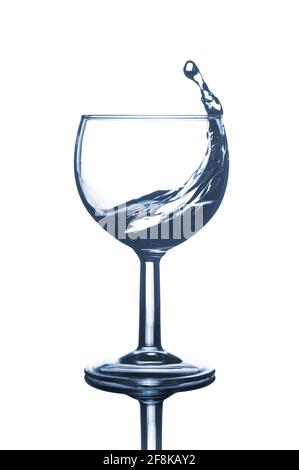 Mineral water with splash, isolated on white background. Beverage with splash. Stock Photo