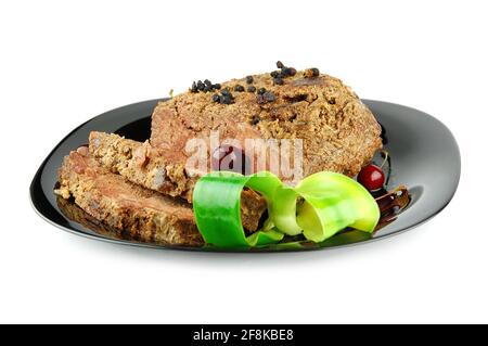 Succulent roast beef on a black plate isolated on a white background. Stock Photo