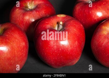 red delicious apple on black background Stock Photo