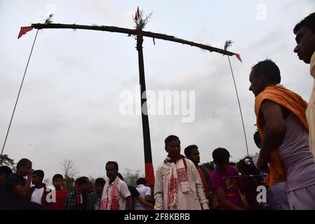 Guwahati, Assam, India. 14th Apr, 2021. Hindu devotee, during Charak Puja festival amid COVID-19 Coronavirus pandemic at a village in Barpeta district of Assam. Charak Puja is a Hindu folk festival in honour of the god Shiva. It's held in Indian state of West Bengal and southern Bangladesh on the last day of the month of Chaitra, at midnight. Credit: David Talukdar/ZUMA Wire/Alamy Live News Stock Photo